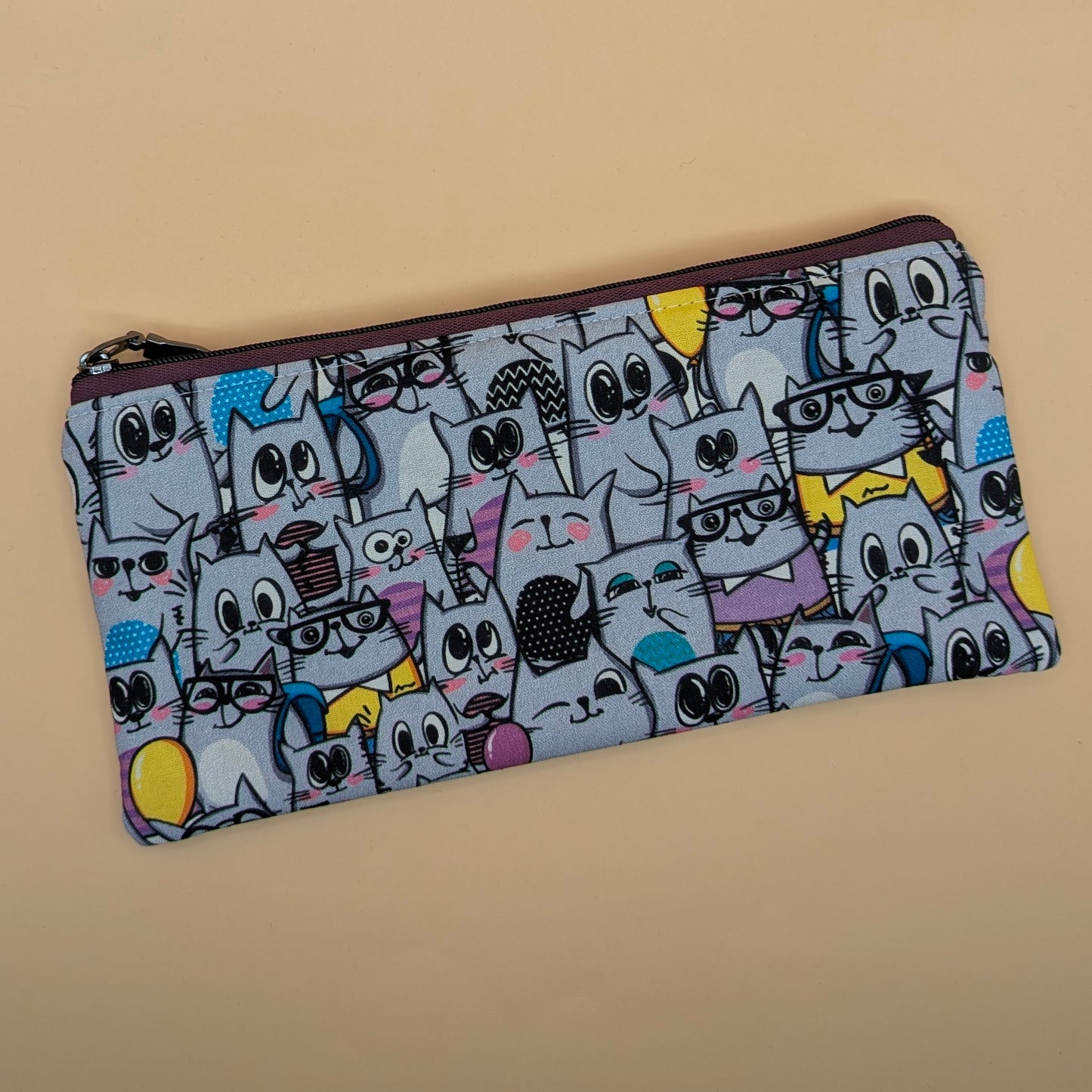 Many Cat Faces Clutch Bag
