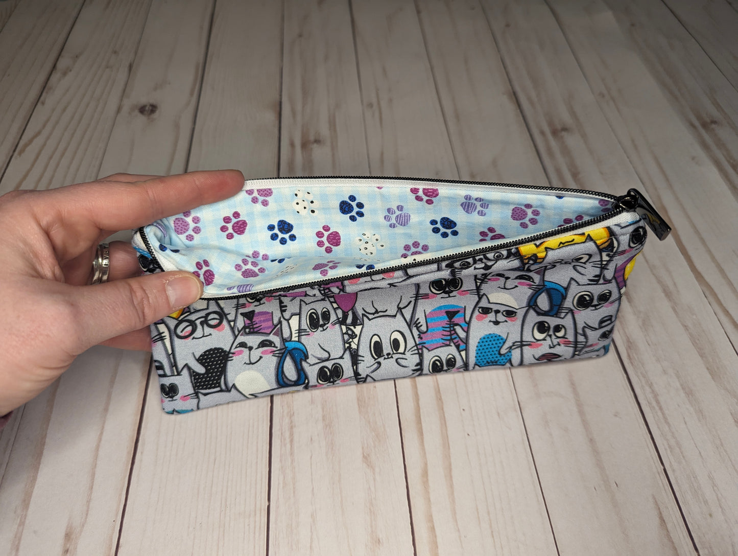 Many Cat Faces Clutch Bag