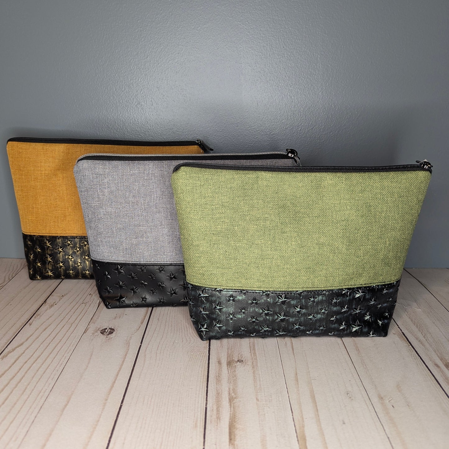 Golden yellow star studded zipper pouch