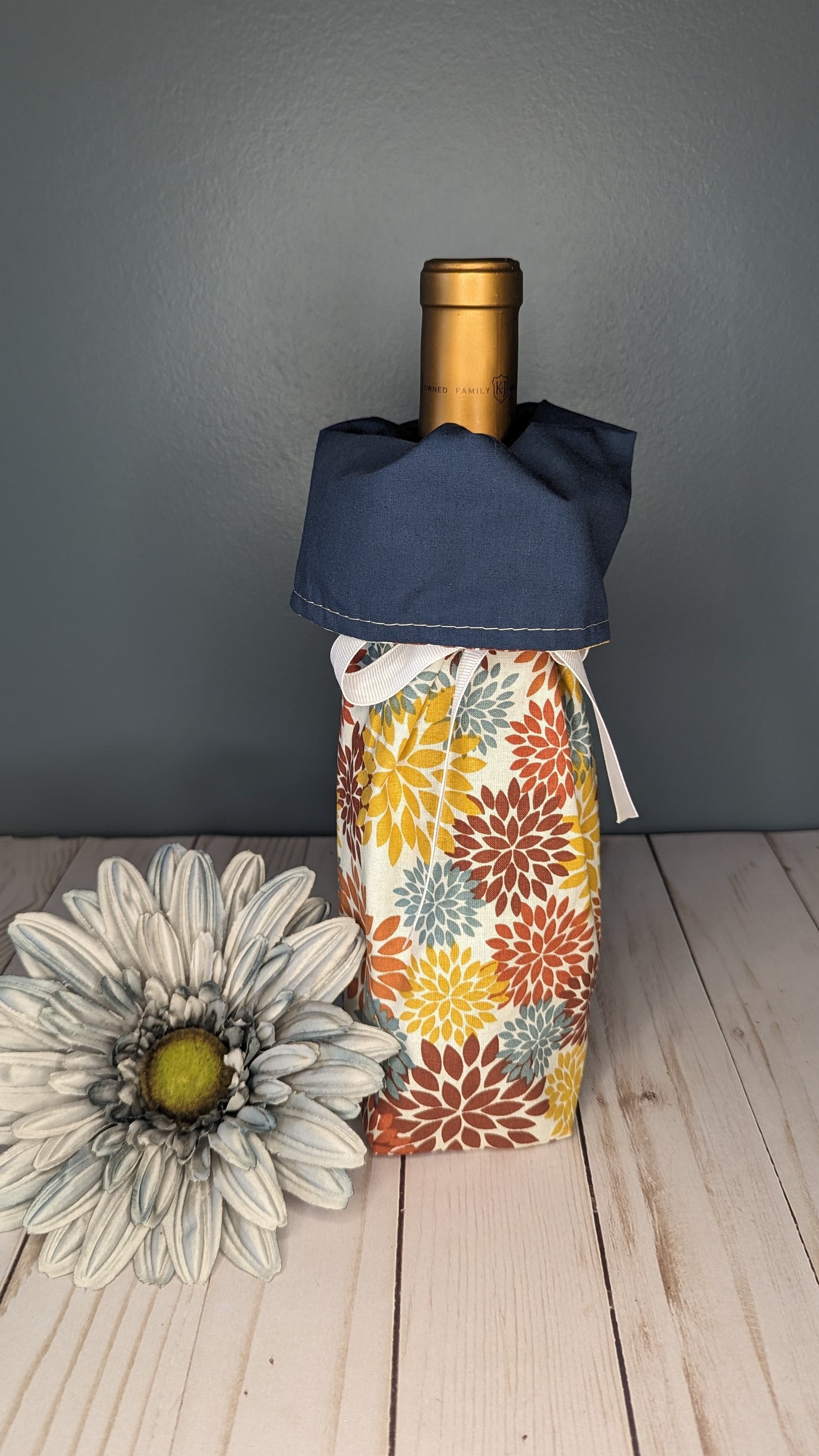 Mums with navy blue, white ribbon