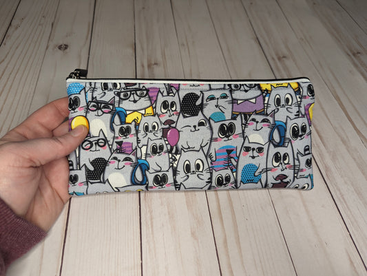Many Cat Faces Clutch Bag